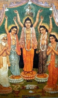 Devotional painting of five robed figures with garlands and raised arms in a temple setting, with lamps, flowers, and a small deity above a green canopy, evoking chanting the Holy Name in Kali‑Yuga.