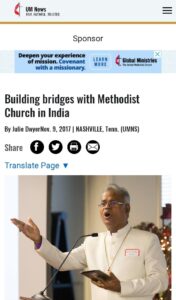 Mobile screenshot of a UM News article titled “Building bridges with Methodist Church in India,” showing a church leader in white speaking at a lectern, share icons, a translate link, and a sponsor banner.