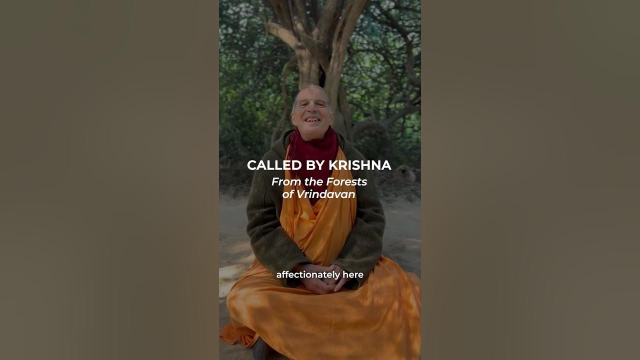 A smiling devotee in saffron robes sits cross-legged beneath a large tree in a wooded setting. On-screen text reads "CALLED BY KRISHNA – From the Forests of Vrindavan." testing