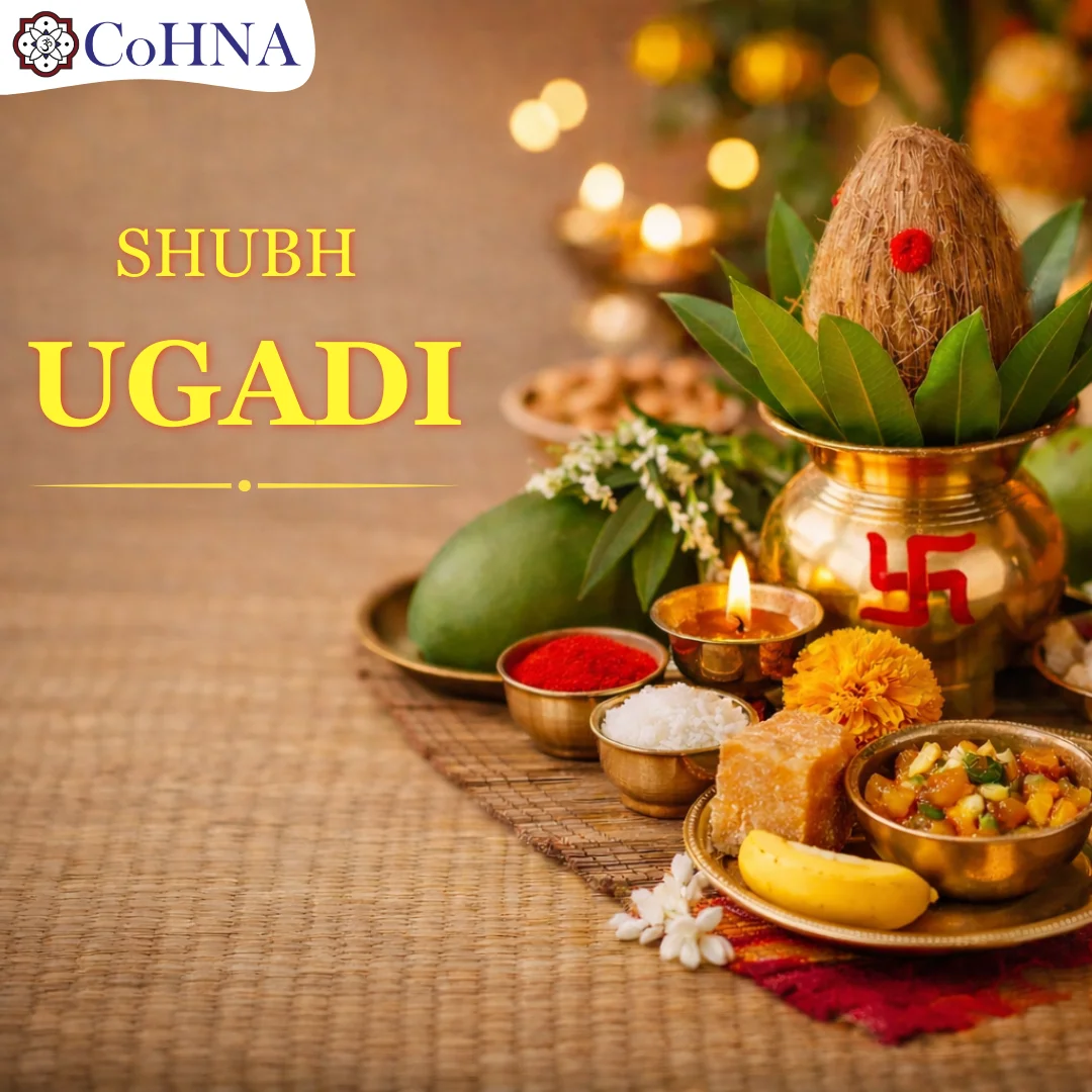 Ugadi Hindu New Year puja setup with brass kalash, coconut and mango leaves, red swastika, lit diya, marigold, kumkum, rice, jaggery, mangoes, and Ugadi pachadi on a mat. Festivals