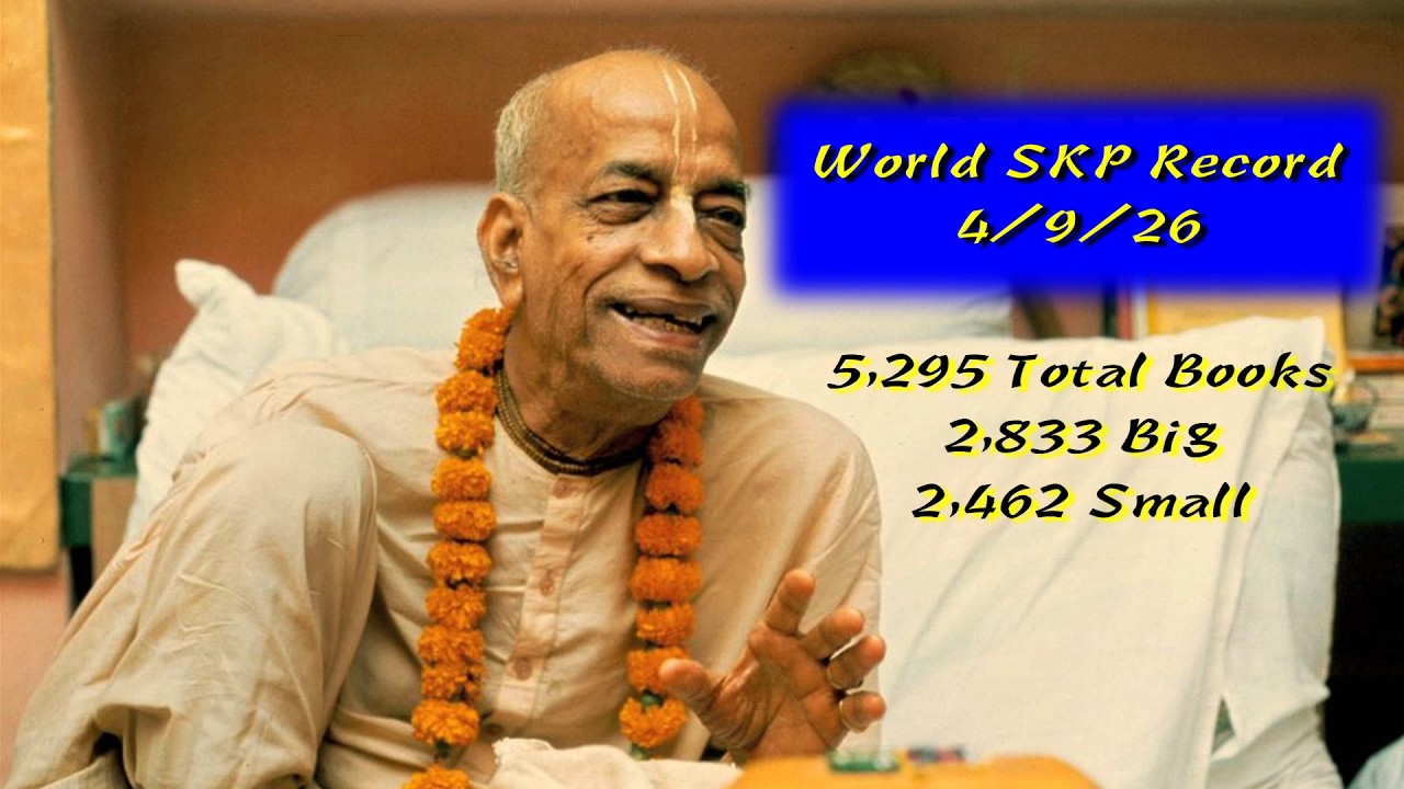 Smiling elderly man in saffron attire with an orange garland sits indoors; blue banner text reads World SKP Record 4/9/26 - 5,295 total books, 2,833 big, 2,462 small; testing metrics noted.