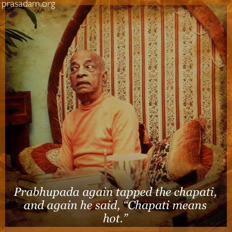 Warm-toned photo of an elderly person in saffron robes on a cushioned chair before an ornate arch, with a metal cup on a table and a quote saying chapati is hot; watermark reads prasadam.org.