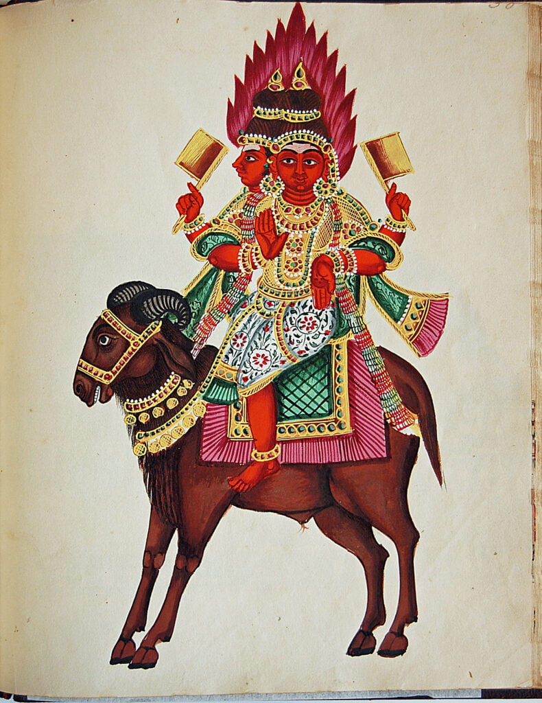 Traditional painting of Agni, the fire deity, with two faces, jeweled ornaments, and flaming halo, riding a decorated ram in Bharatavarsha history.