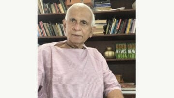 Elderly Indian man seated before bookshelves, illustrating a Book Review on Bharat, Bharatiya civilization, Dharma, and Indian identity.