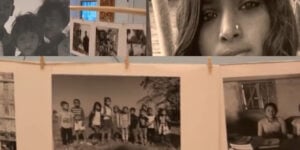 Sepia collage of family photographs hanging on a line beside a woman's face, used for Venezuela earthquake relief story on Indian doctors and Ram Siya Ram.
