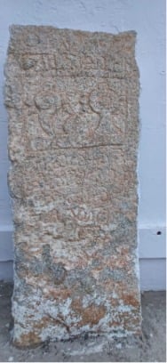 Weathered stone donation inscription from Devanahalli, Karnataka, linked to Devanapura and the Rukmini-Satyabhama Venugopalaswamy Temple near Bengaluru.