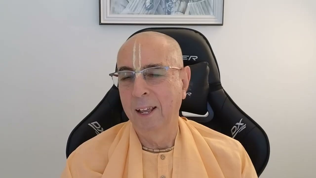 Vaishnava speaker in saffron robes during a Hungary English class on Brihad Bhagavatamrita 1.2.53-62 from Niranjana Swami Official