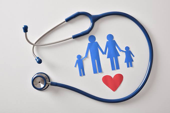 Blue stethoscope encircling paper family figures and a red heart, symbolizing family doctor care, trust, and Health in Bharat.