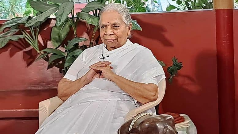 Dr. S. G. Susheelamma, Padma Shri 2026 awardee from Karnataka, seated in a white sari beside plants for a Bharat Positive feature