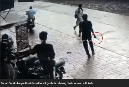 Purported CCTV frame from Karnataka's Puttur showing people on a street, with a red circle marking an object linked to the Hindu Existence knife-threat report.