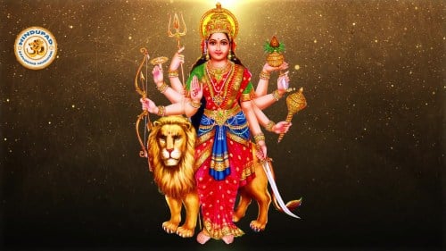 Goddess Parvati in a red sari and golden crown, with multiple arms holding sacred objects, standing beside her lion vehicle against a glowing backdrop.