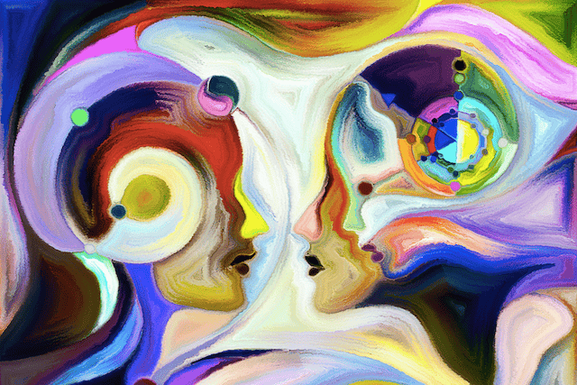 Surreal multicolored painting of two human profiles facing closely, their contrasting faces suggesting the struggle to feel heard, valued, and understood.