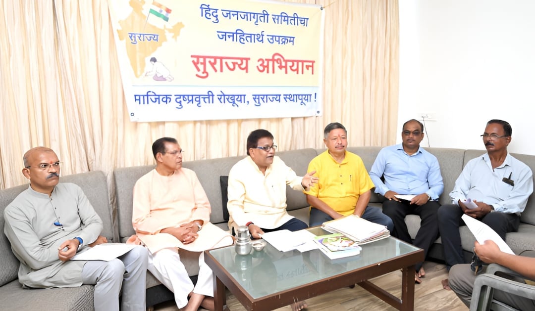 Surajya Abhiyan representatives seated at a press meeting beneath a Marathi banner about the Konkan Hapus mango crisis inquiry.