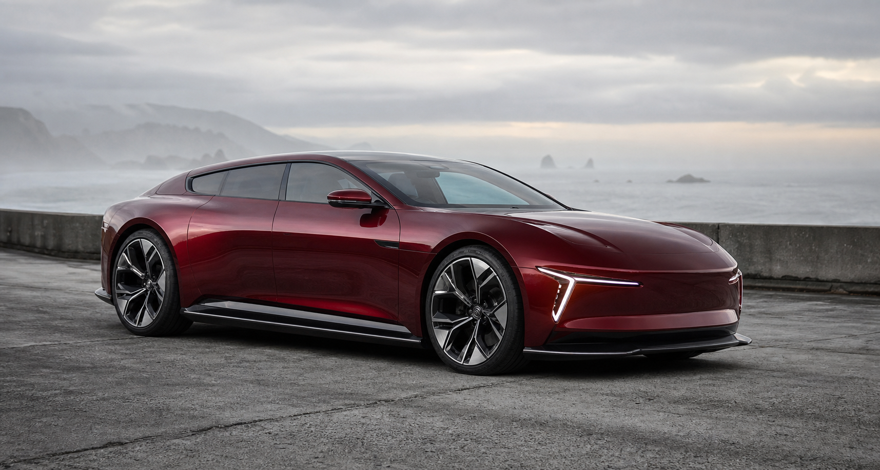 An original crimson electric grand tourer with a short nose, long wheelbase, and forward-set cabin on a misty coastal road.