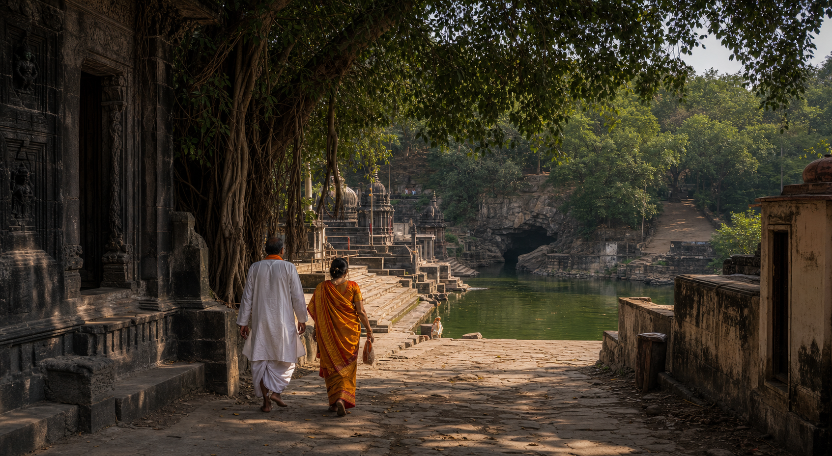 Pilgrims follow an old Panchavati lane from a dark-stone temple precinct toward the Godavari ghats, with banyan trees and a shaded rocky passage along the route.