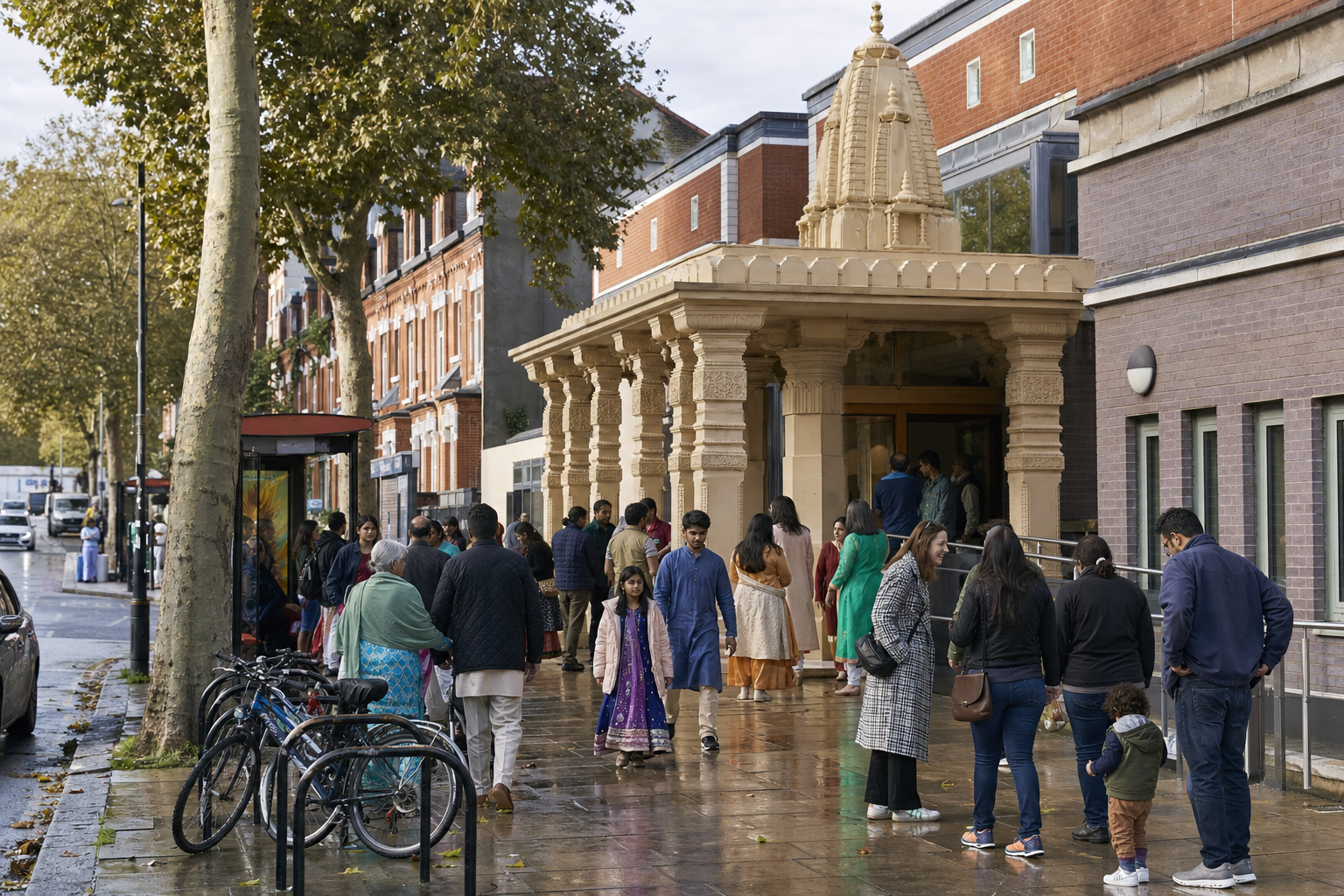 A Hindu temple on a British urban street as families, volunteers and neighbours gather outside after rain.