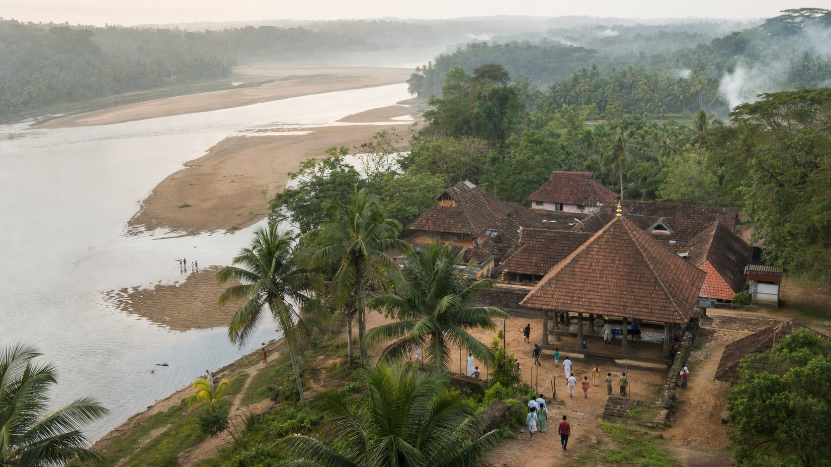 The Nila River curves past sandy banks, coconut groves, and a traditional Kerala temple as small groups of pilgrims approach the water at Tirunavaya.