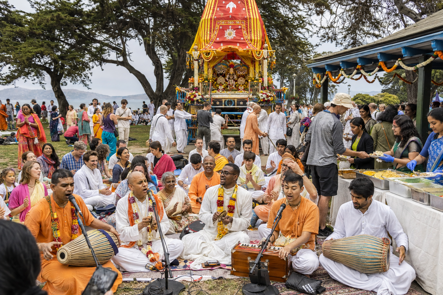 Devotees lead kirtan beside a decorated Rathayatra chariot as families and visitors join the gathering and volunteers distribute vegetarian food.