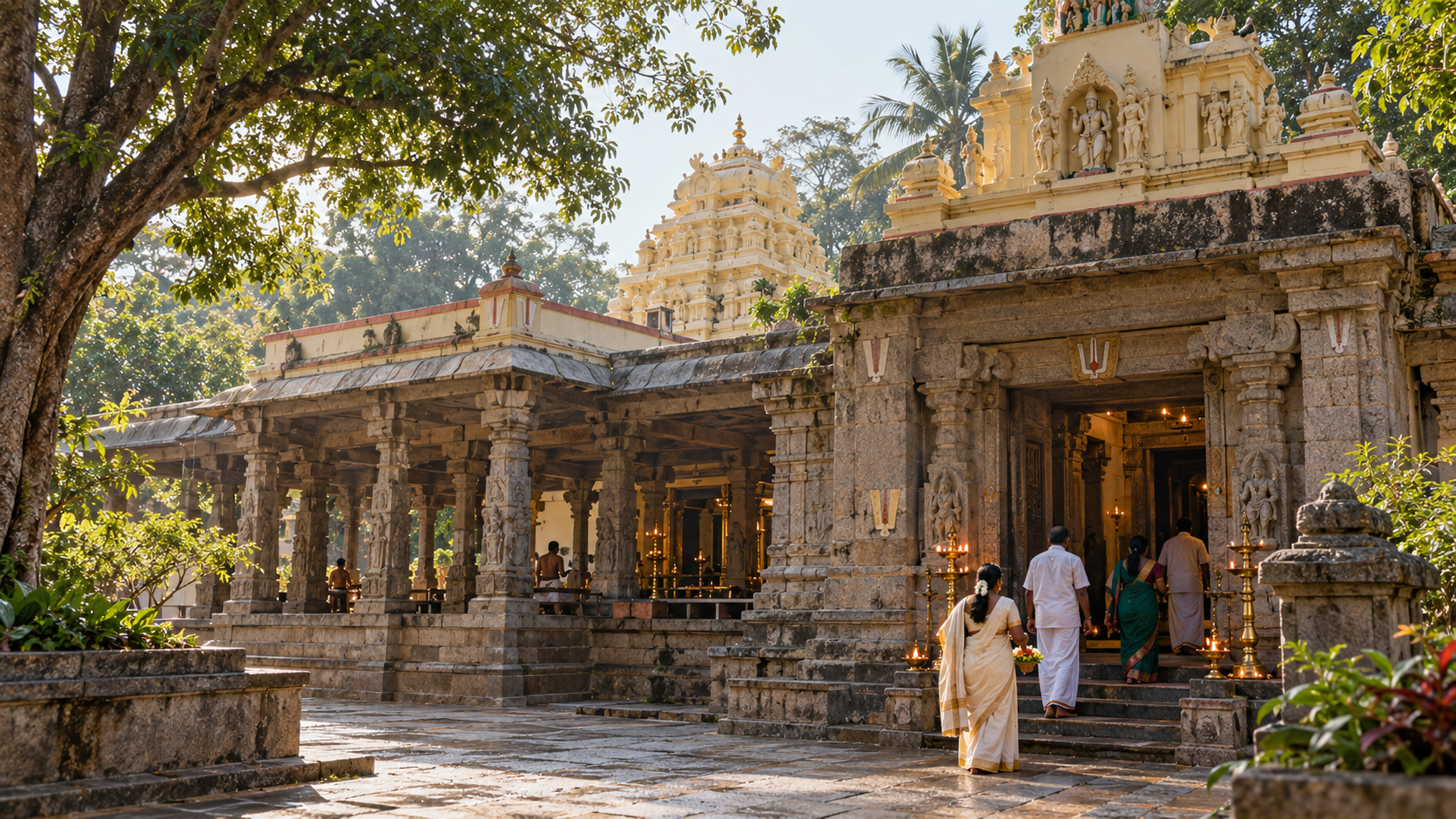 Worshippers enter Champakadhama Temple through a complex of weathered stone halls and later architectural additions in morning light.