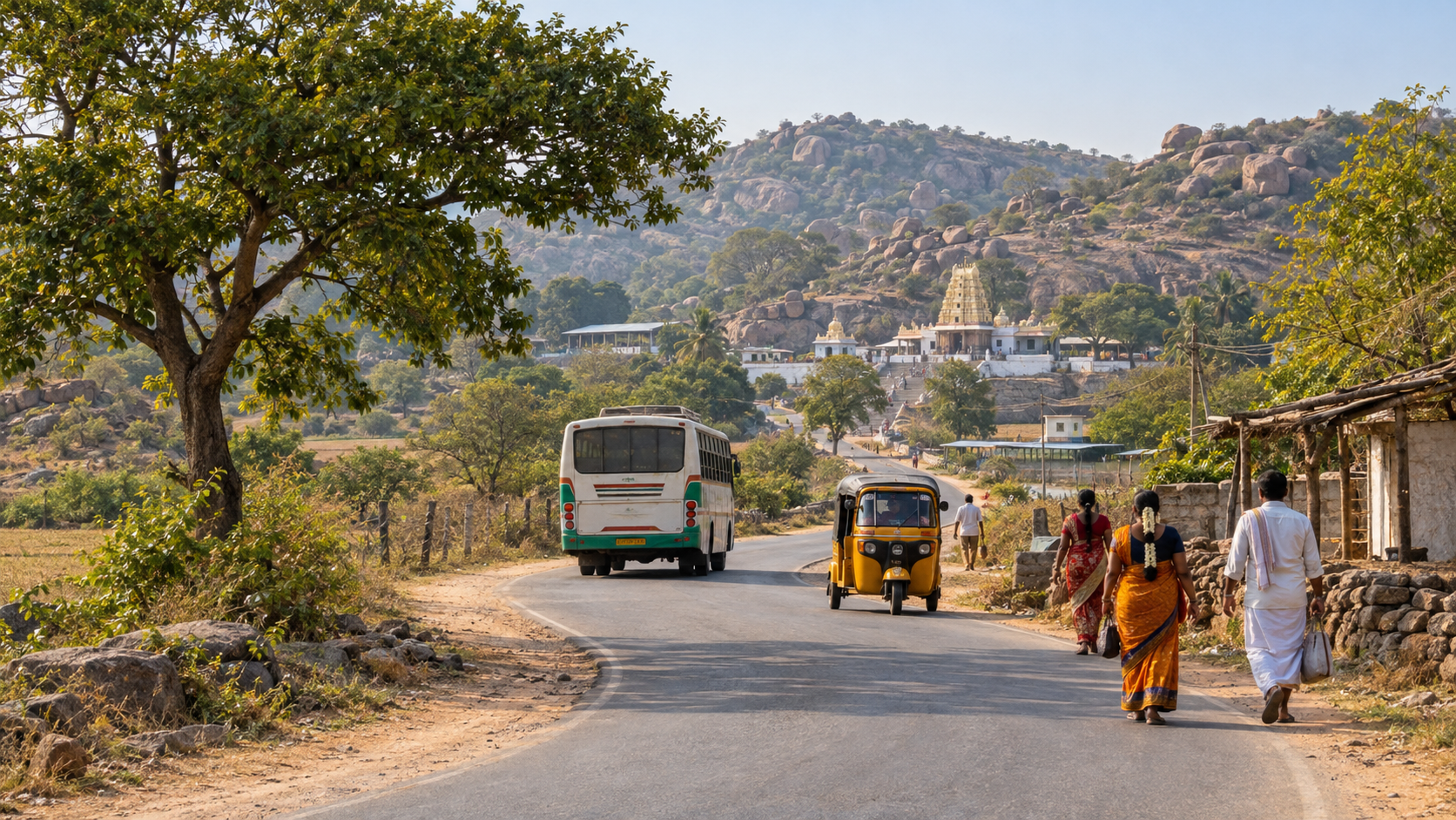 A rural road near Nagasanpally leads pilgrims and local transport toward the temple and rocky hills.